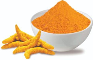 Grahshri turmeric powder in bowl”, “golden milk with turmeric